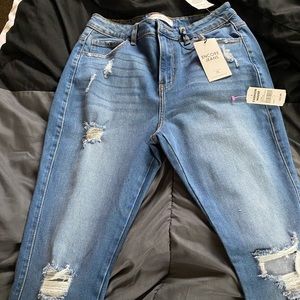 Ripped blue jeans new never worn
